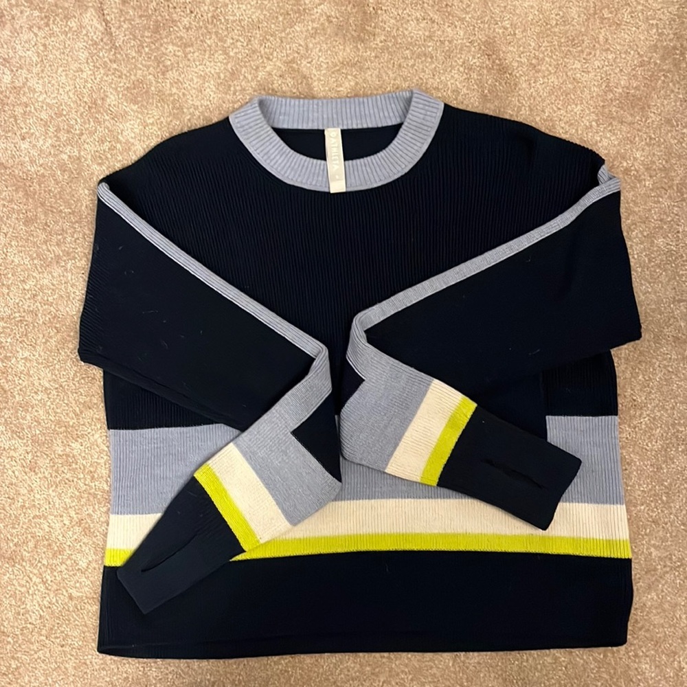 Size small blue, white, and green striped Athleta sweater in great condition.